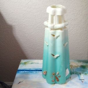 Vintage Light house Candle burns lamp oil.